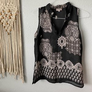 Sleeveless black dress shirt